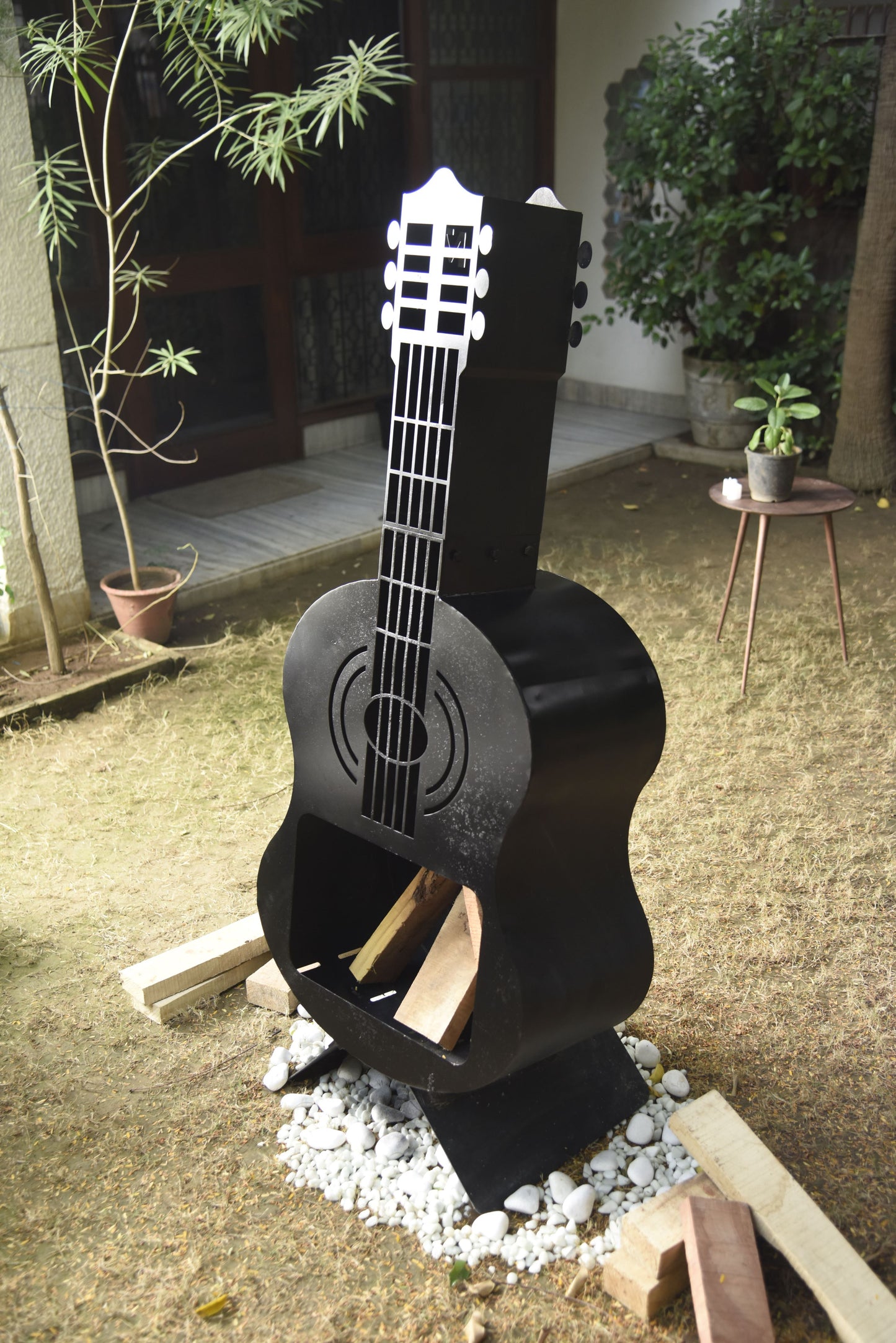 Black Guitar outdoor fire pit