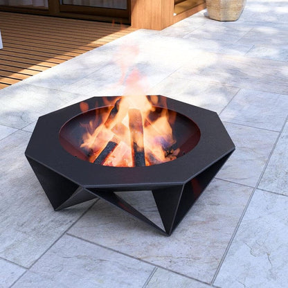 Hexagonal fire pit with flames on a stone patio. Diamond shaped firepit for bonfire bbq and grilling, elegant, luxury outdoor home decor